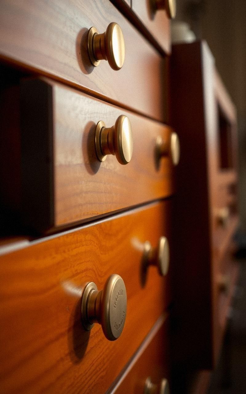 Brass Accents Through Decorative Hardware