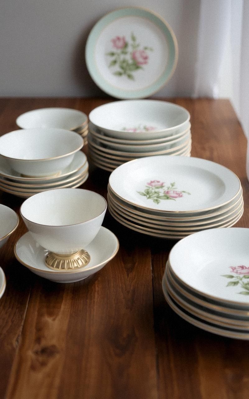 Hand-Painted Porcelain Dishes With Floral Designs