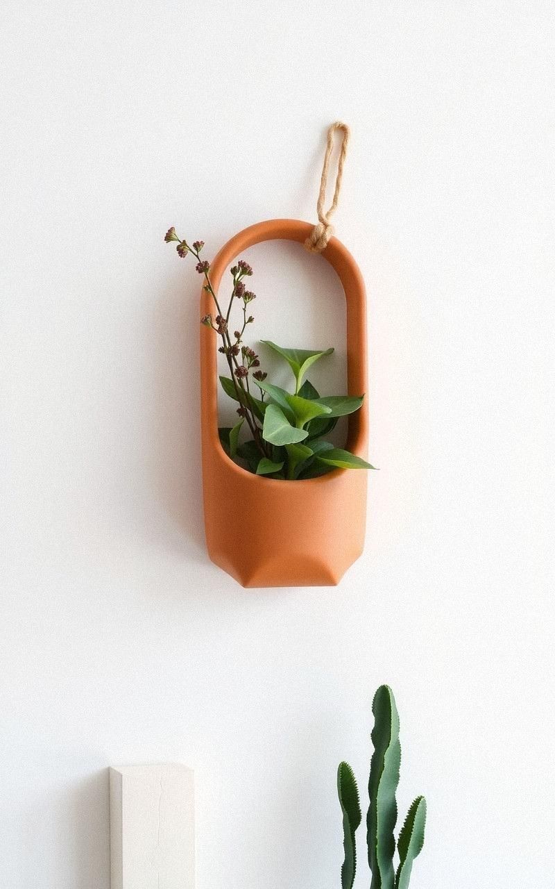 Chic Clay Wall Pockets for Functional Art